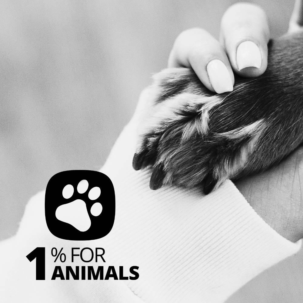 1% For Animals Logo with a woman holding her dog's paw